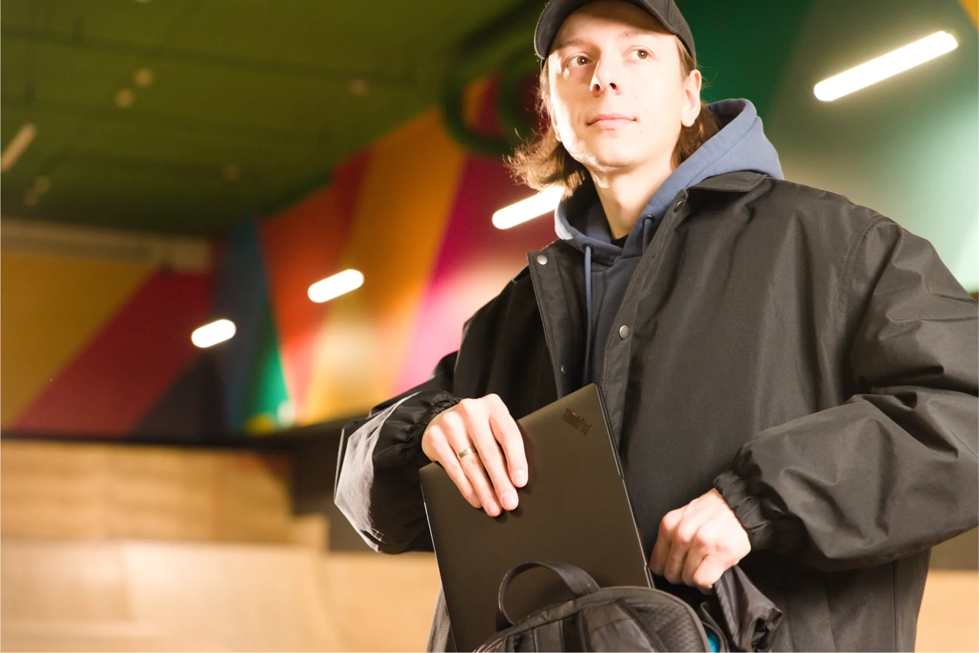 a person hides a laptop