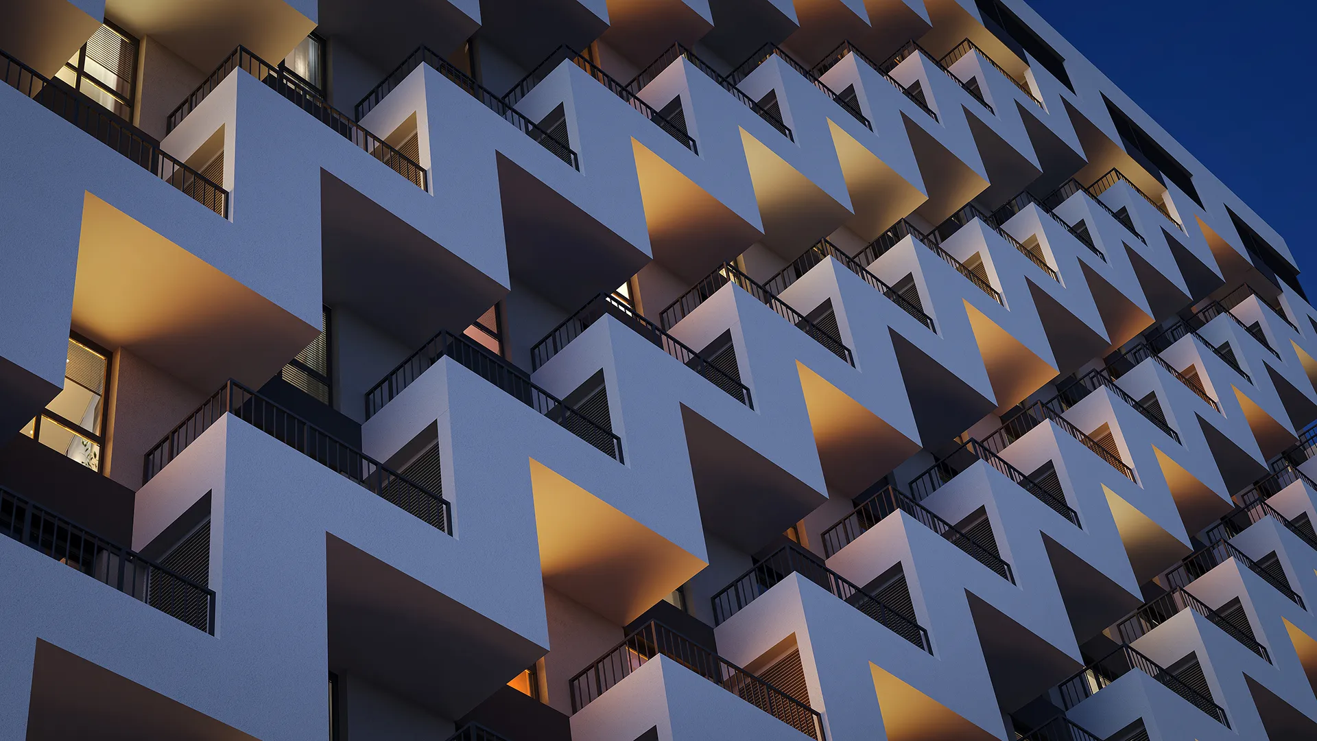 Фасад сучасної будівлі з геометричним малюнком балконів, освітлених золотистим сонячним світлом, що створює контраст між світлими та темними сторонами, металеві перила та великі вікна на фоні блакитного неба.